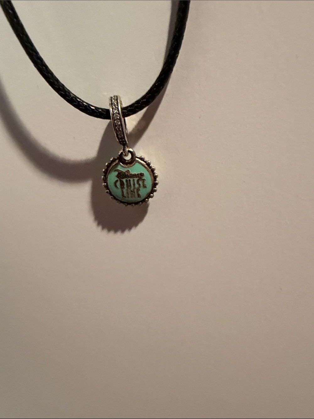Disney cruise line Turquoise Disc Pendant 25 yrs Necklace Black Cord